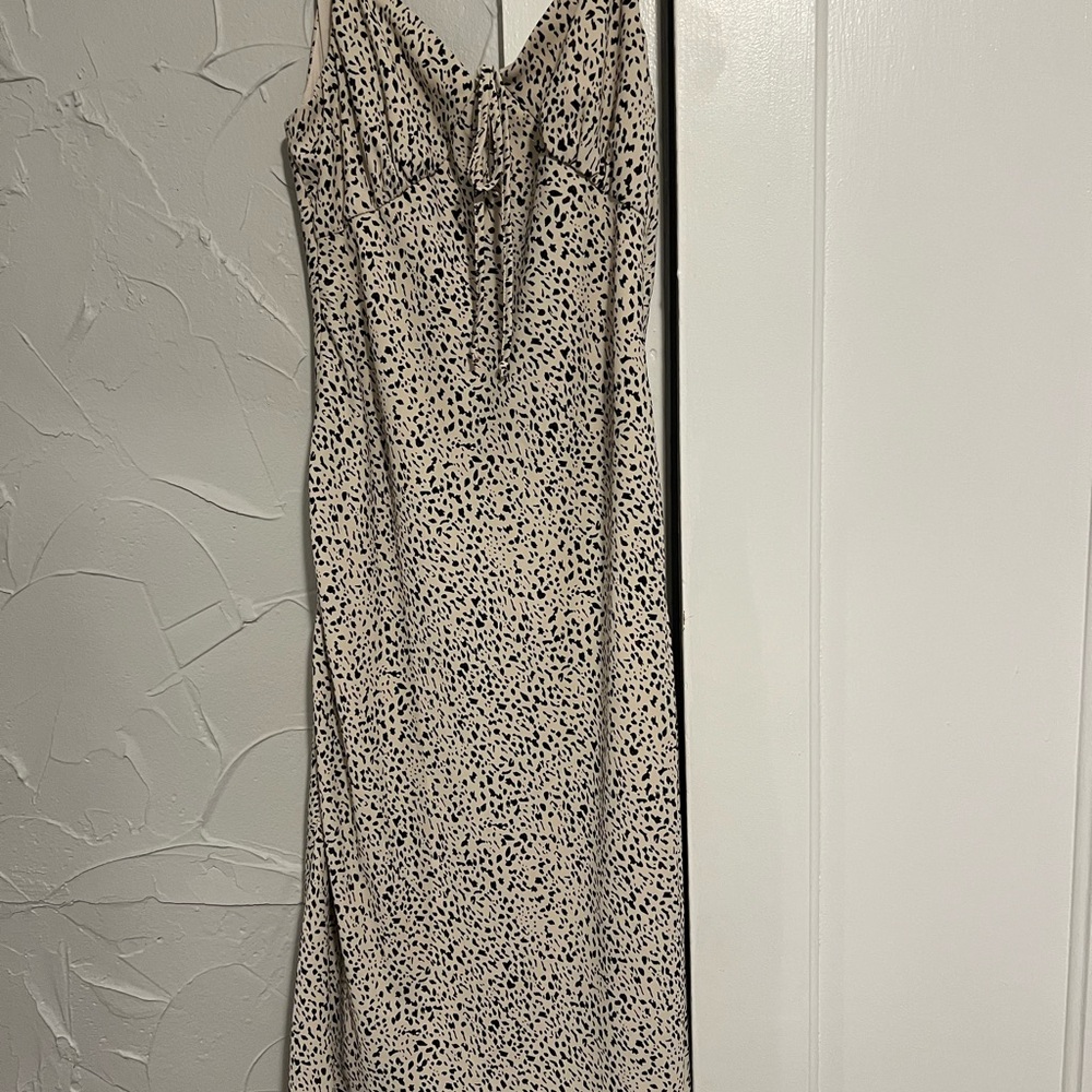 Elegant Beige and Black Spotted Dress
